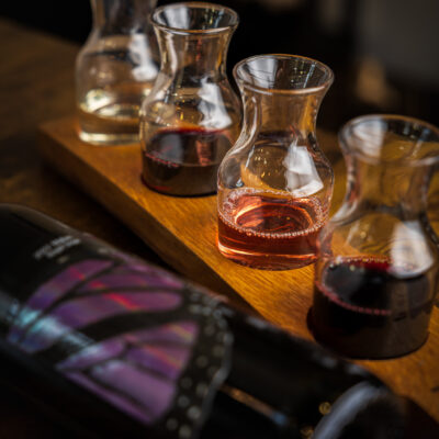 Wine Tasting Flight from Monarcha Winery inside Monarcha tasting room at Columbia Gardens Wine and Artisan Village