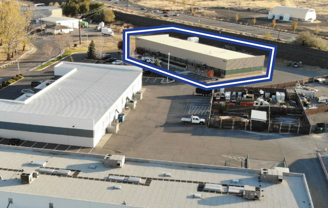 Aerial of some Oak Street Industrial Park buildings with Building C outlined in blue and white.