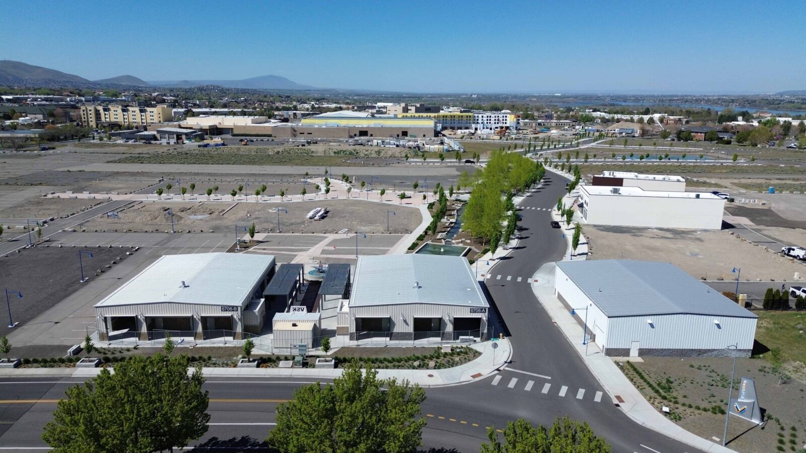 Aerial of Vista Field showing community pavilions, Blueberry Bridal and KUKI Izakaya, April 2026.