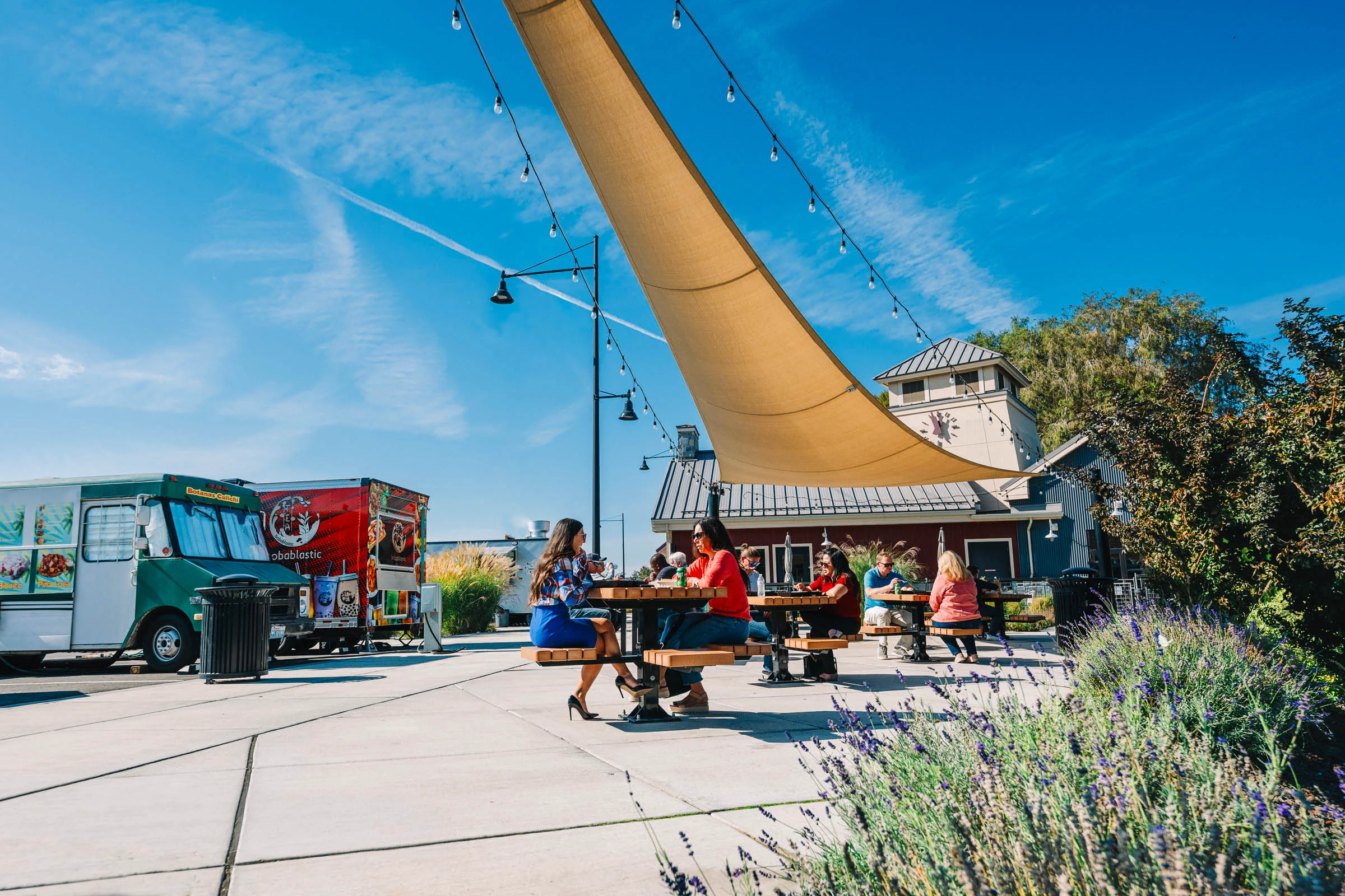 Guest enjoying the Food Truck Plaza at Columbia Gardens.